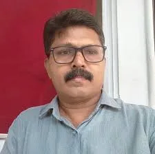 Benny Dominic Arundhati Roy